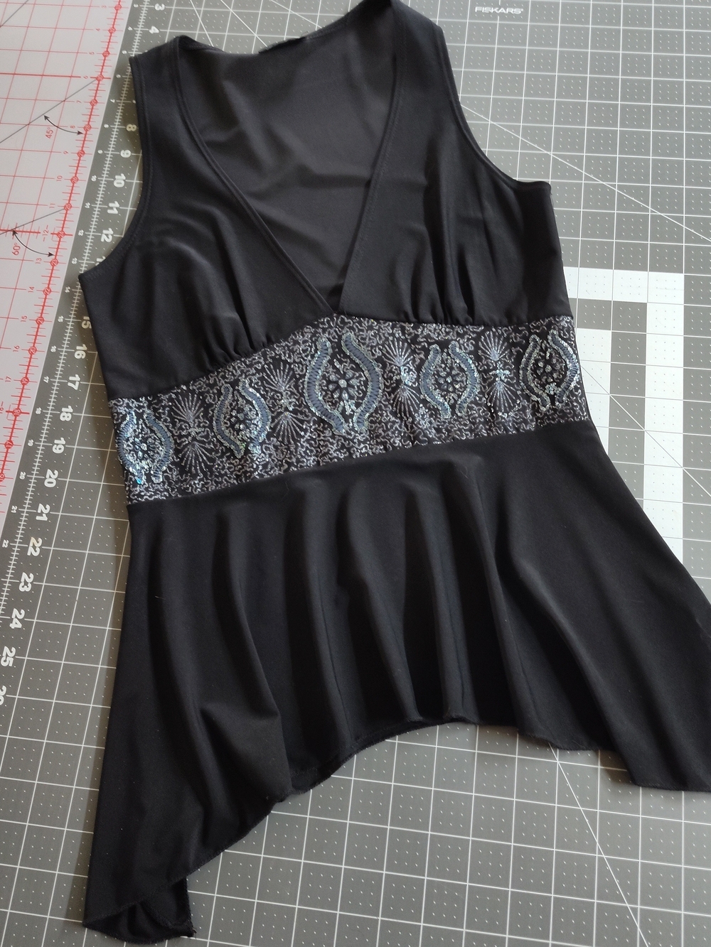 Wet Seal Black Sleeveless V-Neck Top with Decorative Waistband